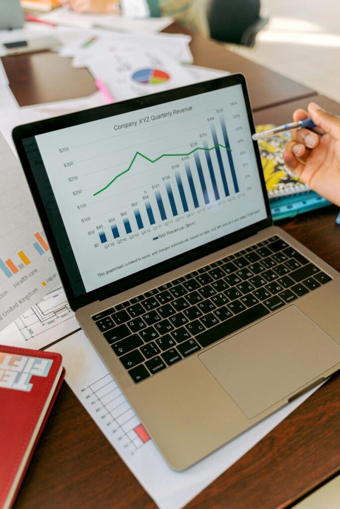 pexels photo 5466250 5466250 A close-up view of a laptop displaying business analytics and revenue charts.